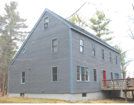 123 Randall Road Berlin, MA 01503 - Photo 1 of 26 a view of a house with a yard