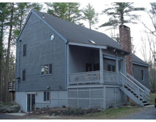 123 Randall Road Berlin, MA 01503 - Photo 25 of 26 a house view with a backyard space