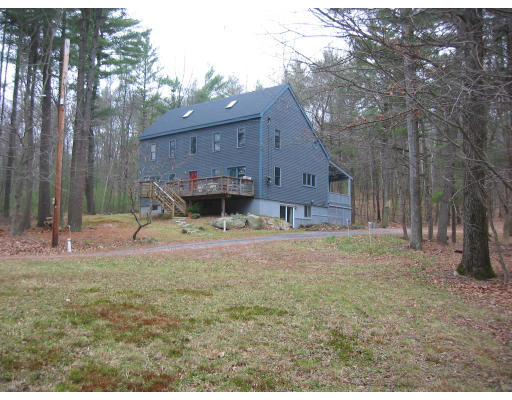 123 Randall Road Berlin, MA 01503 - Photo 26 of 26 a view of a house with backyard