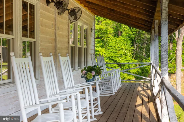 a view of balcony with potted plants