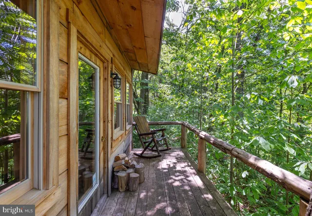 a view of balcony with furniture