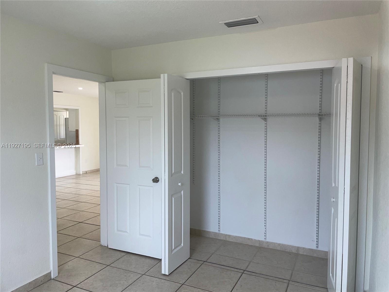 13017 Southwest 18th Terrace, Unit 13017 Miami, FL 33175 - Photo 19 of 21 a view of an empty room