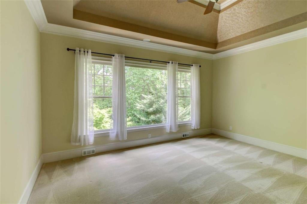 7520 Ledgewood Way Suwanee, GA 30024 - Photo 32 of 95 a view of an empty room with a window