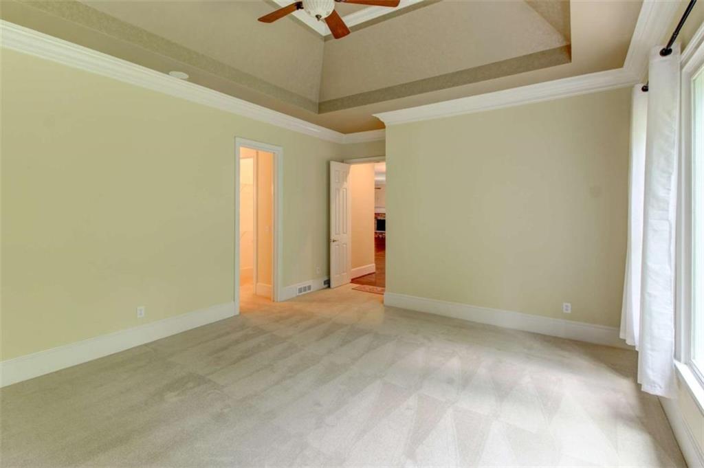 7520 Ledgewood Way Suwanee, GA 30024 - Photo 34 of 95 a view of an empty room