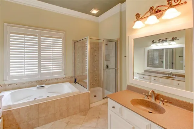 a bathroom with a sink and shower