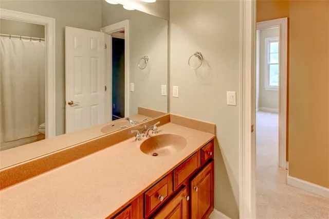 an aerial view of a house with outdoor space