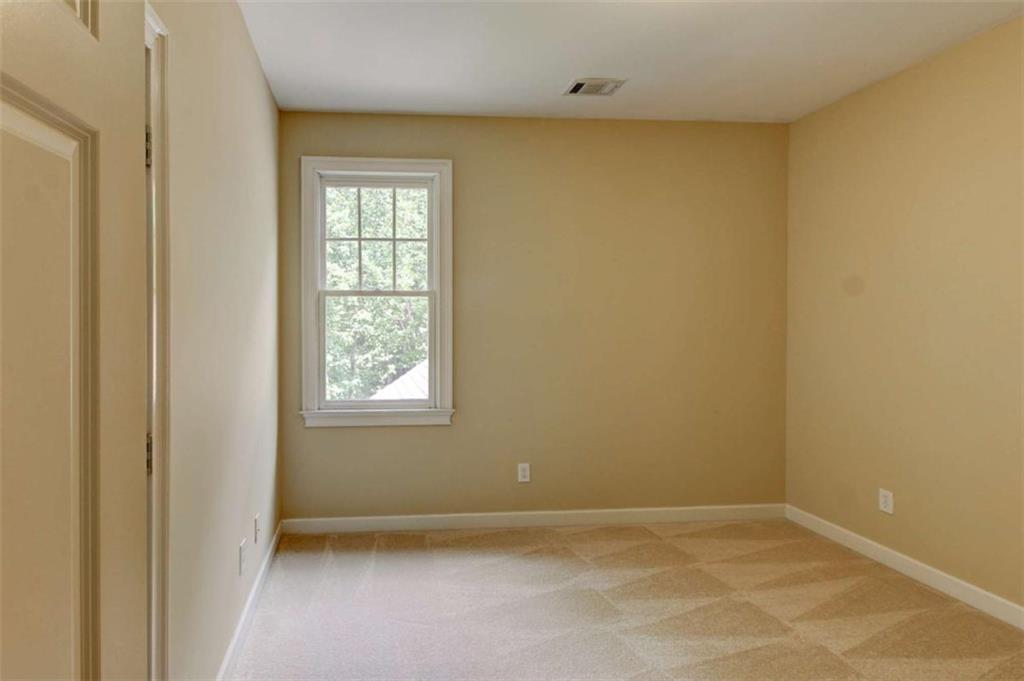 7520 Ledgewood Way Suwanee, GA 30024 - Photo 56 of 95 an empty room with a window