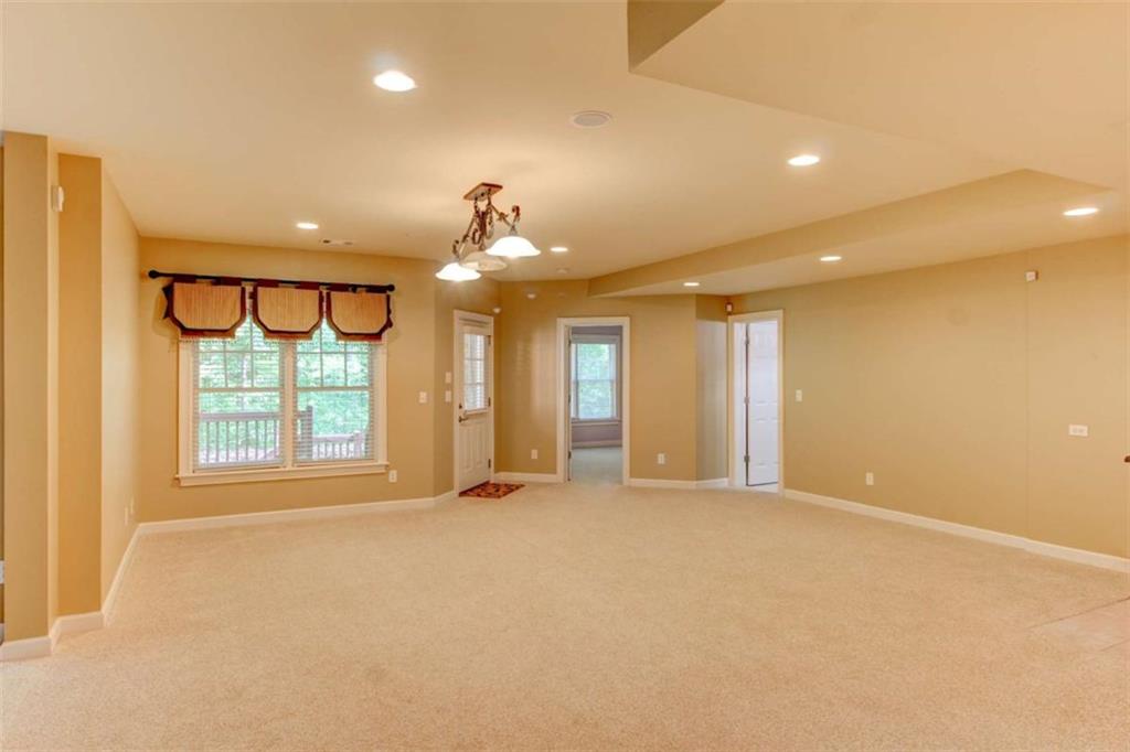 7520 Ledgewood Way Suwanee, GA 30024 - Photo 64 of 95 a view of an empty room with a window