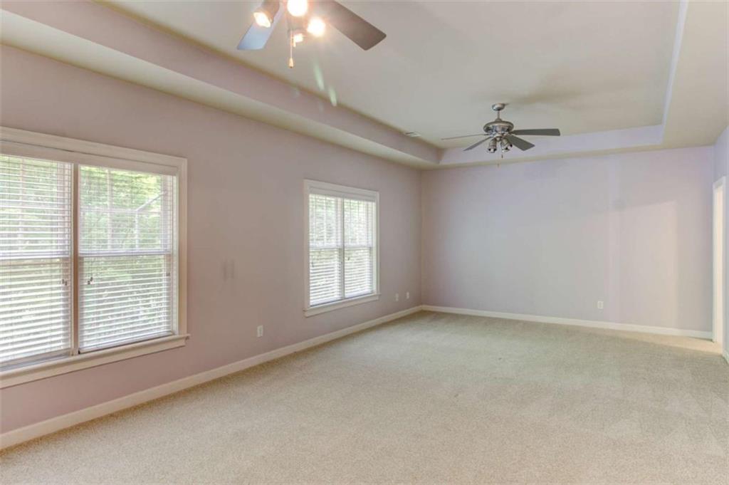 7520 Ledgewood Way Suwanee, GA 30024 - Photo 68 of 95 a view of an empty room with a window