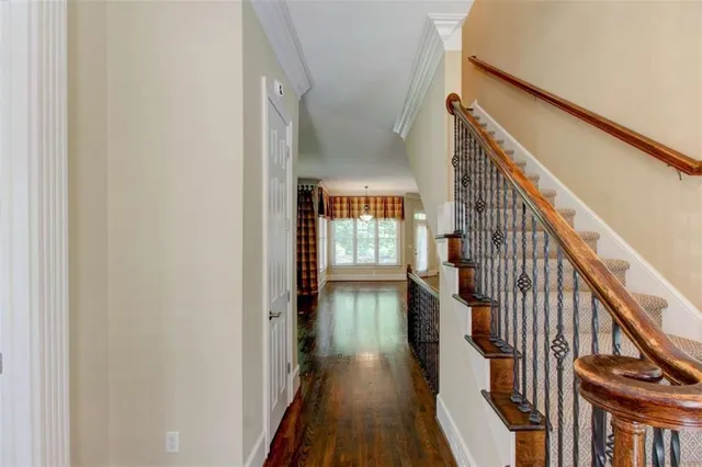 a kitchen with stainless steel appliances granite countertop a refrigerator and a stove