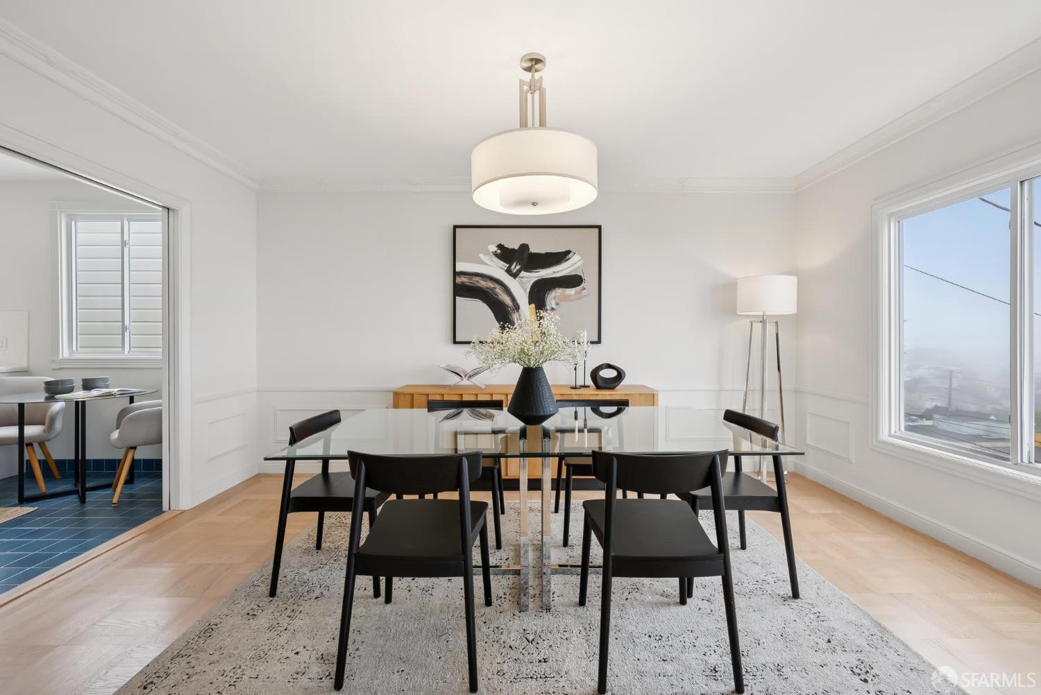 1867 15th Avenue San Francisco, CA 94122 - Photo 11 of 75 a view of a dining room with furniture and wooden floor