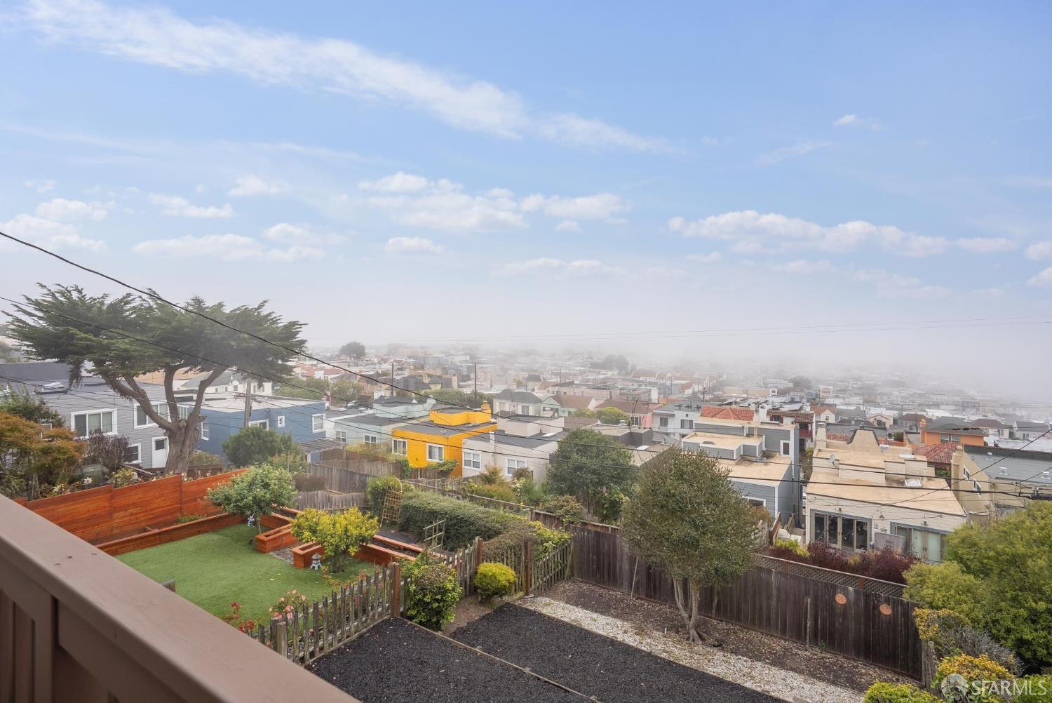 1867 15th Avenue San Francisco, CA 94122 - Photo 16 of 75 a view of a lake with a city