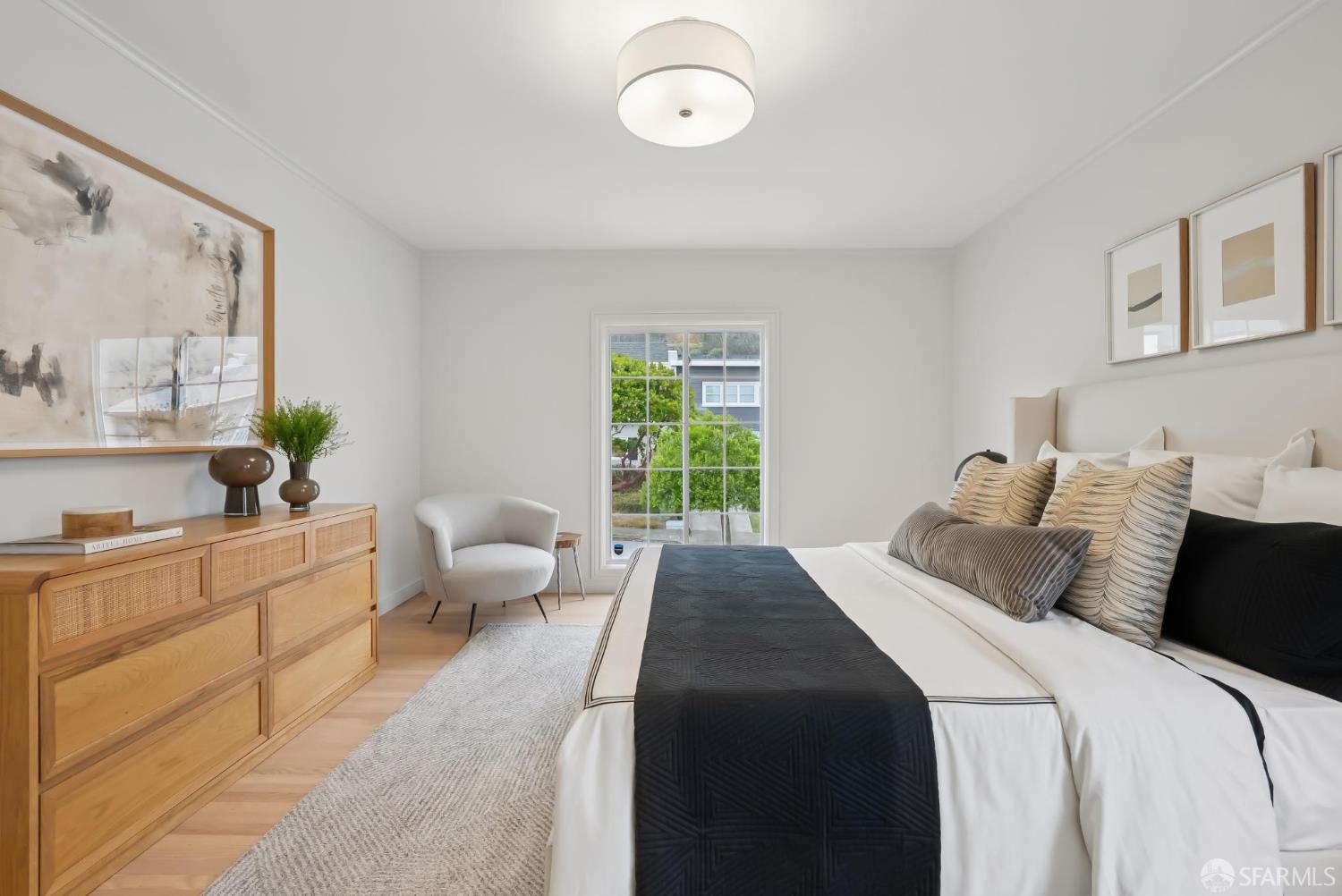 1867 15th Avenue San Francisco, CA 94122 - Photo 25 of 75 a bedroom with a bed and a large window