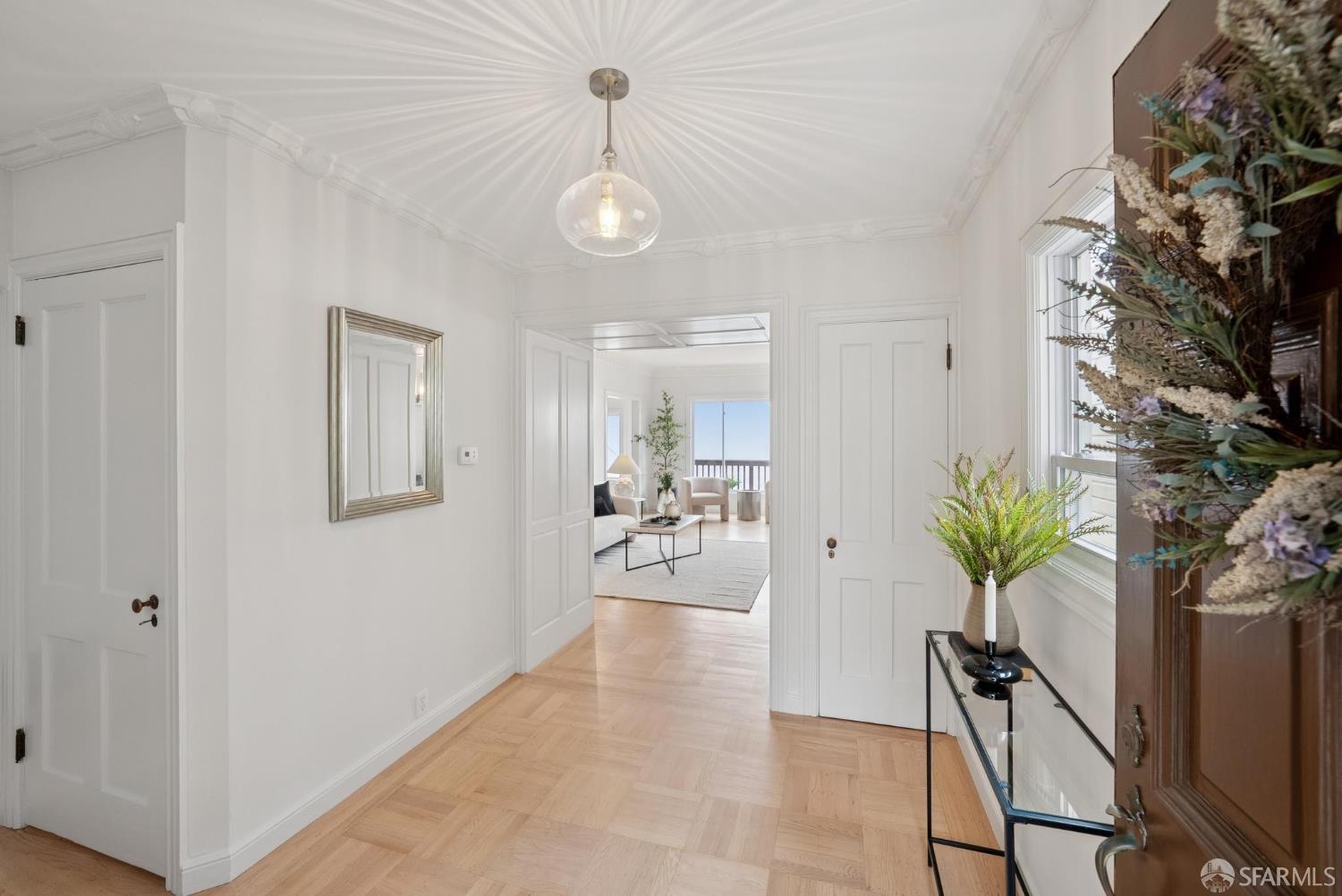 1867 15th Avenue San Francisco, CA 94122 - Photo 3 of 75 a view of a hallway with potted plant