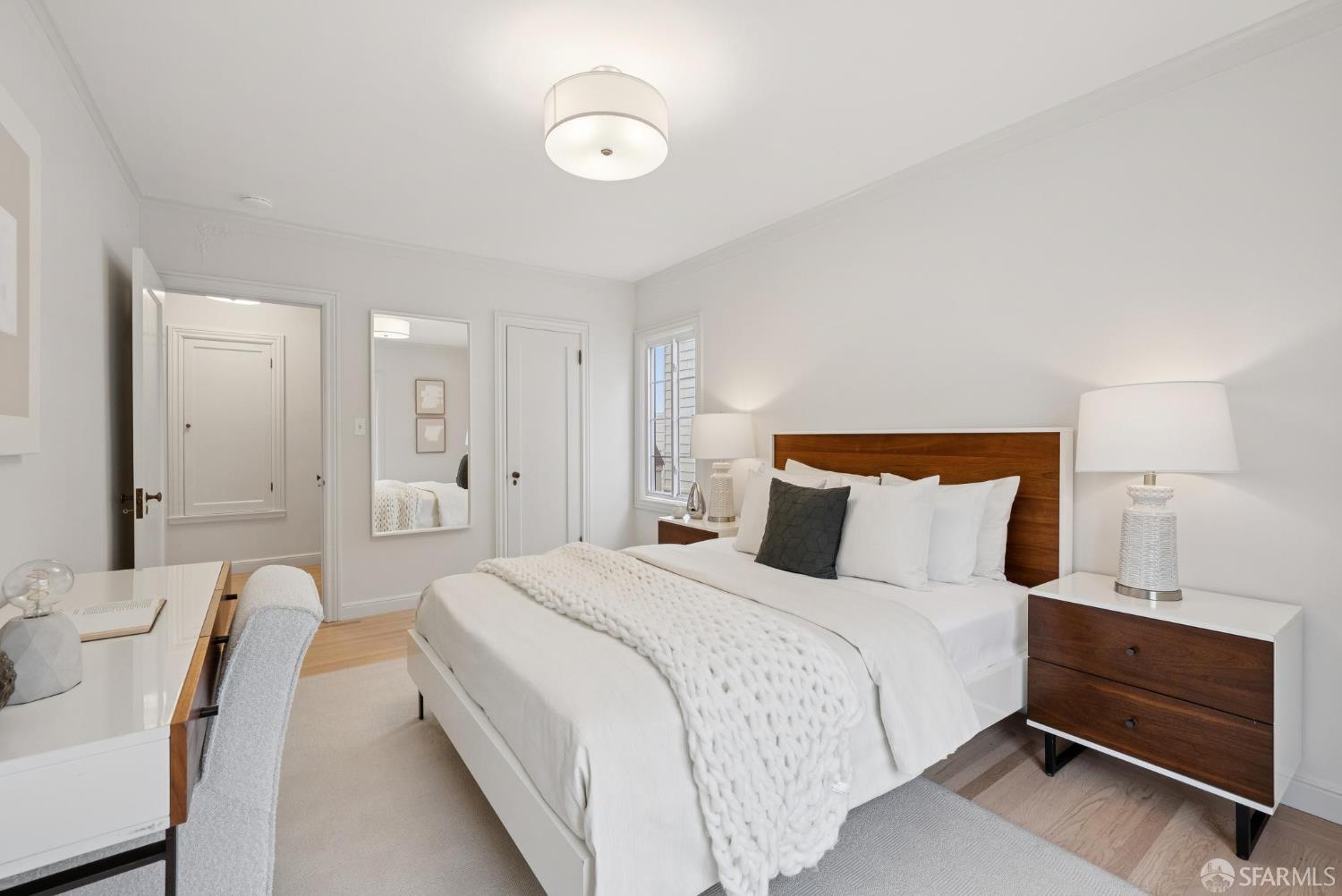 1867 15th Avenue San Francisco, CA 94122 - Photo 35 of 75 a bedroom with bed and window