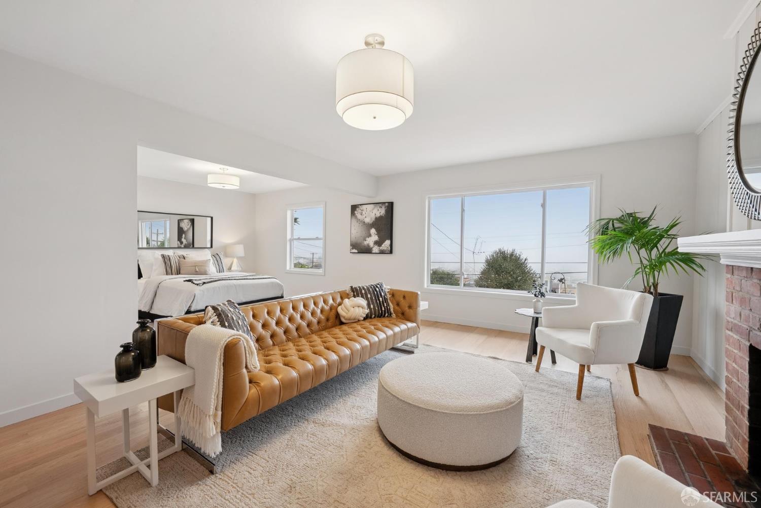 1867 15th Avenue San Francisco, CA 94122 - Photo 40 of 75 a living room with furniture and a potted plant