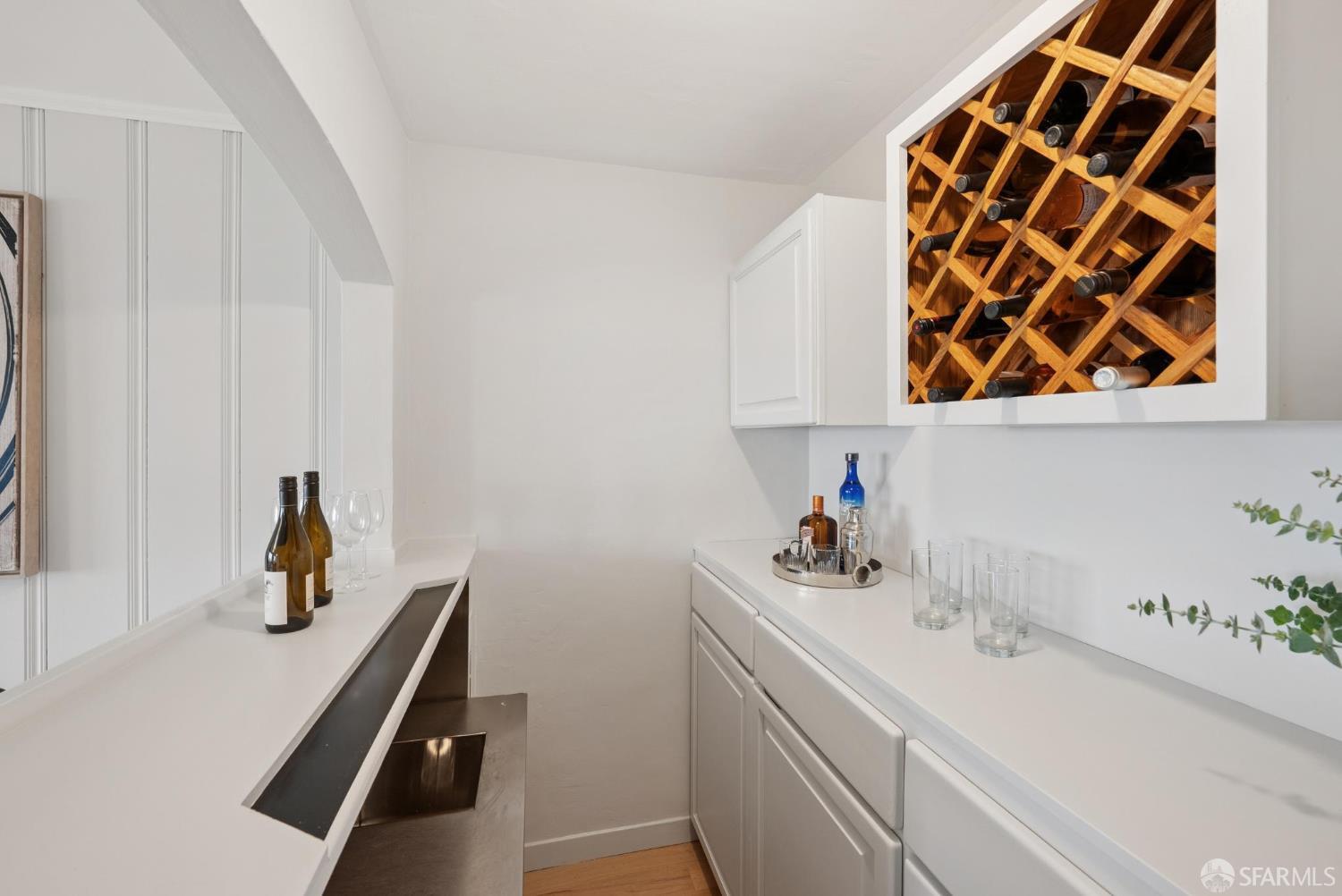 1867 15th Avenue San Francisco, CA 94122 - Photo 43 of 75 a bathroom with a sink and a mirror