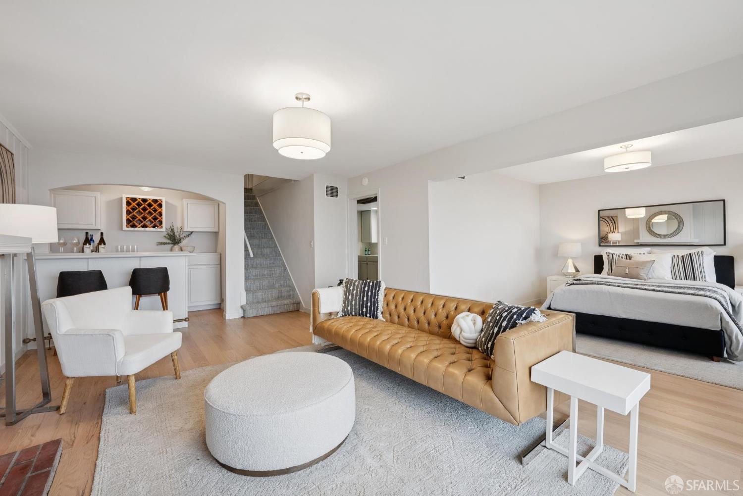 1867 15th Avenue San Francisco, CA 94122 - Photo 44 of 75 a living room with furniture and a wooden floor