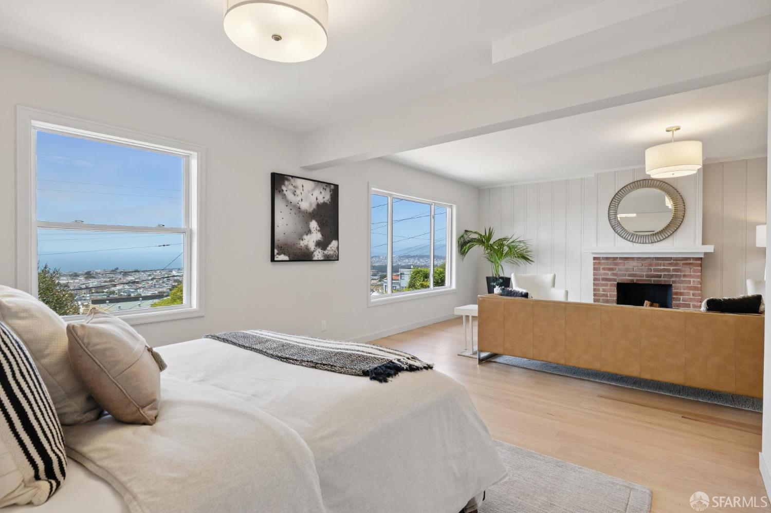 1867 15th Avenue San Francisco, CA 94122 - Photo 47 of 75 a bedroom with furniture a fireplace and a large window