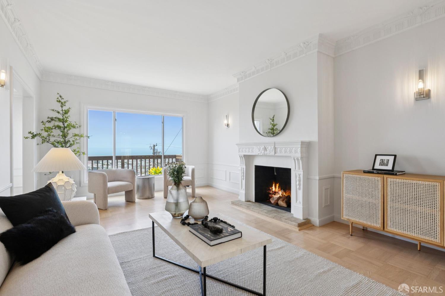 1867 15th Avenue San Francisco, CA 94122 - Photo 5 of 75 a living room with furniture a fireplace and a large window