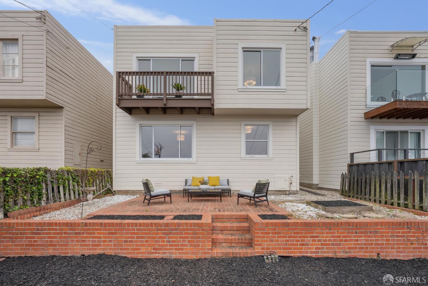 1867 15th Avenue San Francisco, CA 94122 - Photo 59 of 75 a view of a house with backyard and sitting area