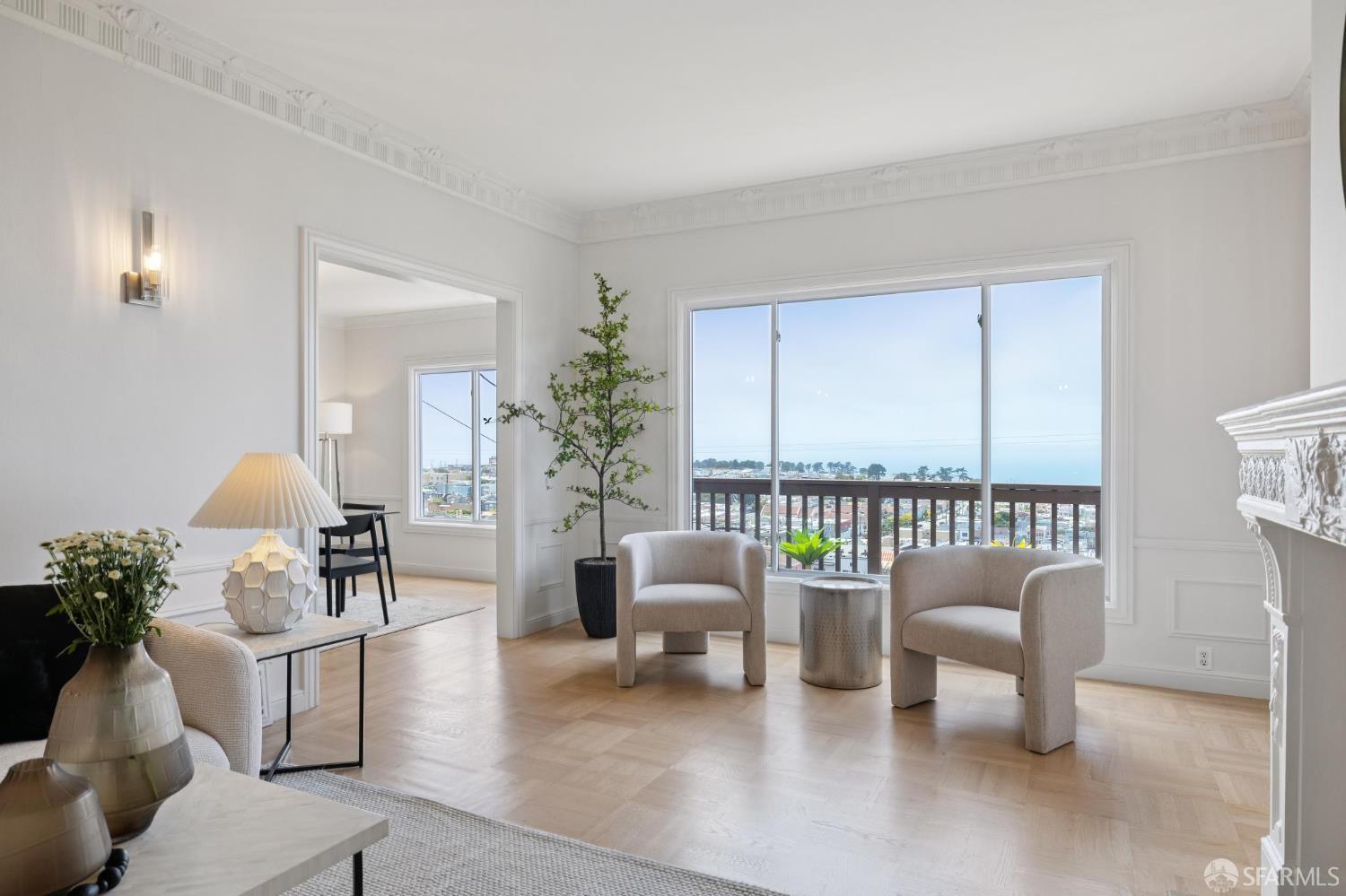 1867 15th Avenue San Francisco, CA 94122 - Photo 6 of 75 a living room with furniture and a large window