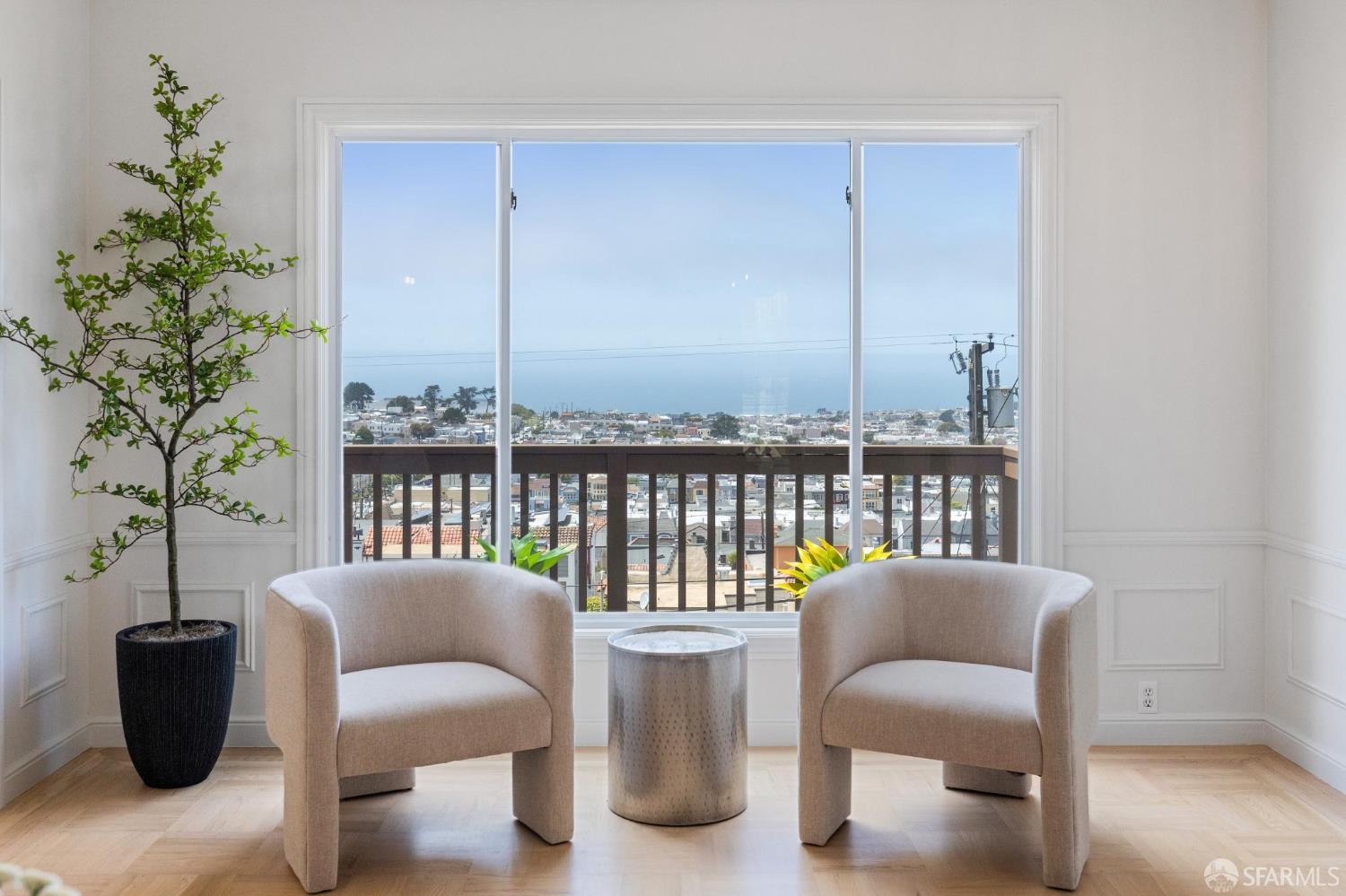 1867 15th Avenue San Francisco, CA 94122 - Photo 7 of 75 a view of a living room and a potted plant