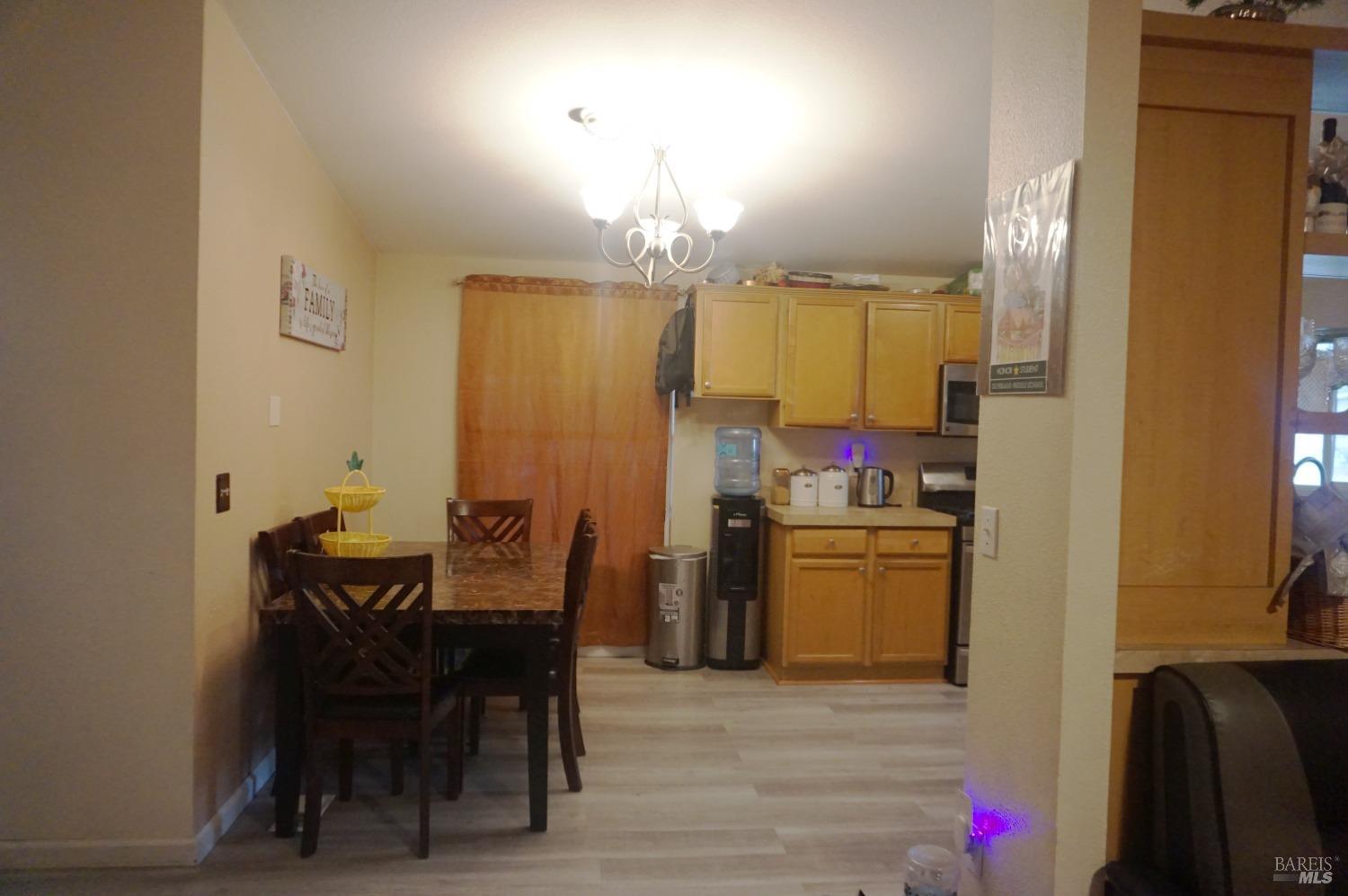 6004 Monticello Road, Unit 7 Napa, CA 94558 - Photo 11 of 33 a dining room with furniture and window