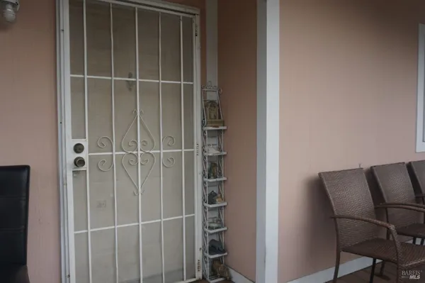 a view of a room with rack on the wall