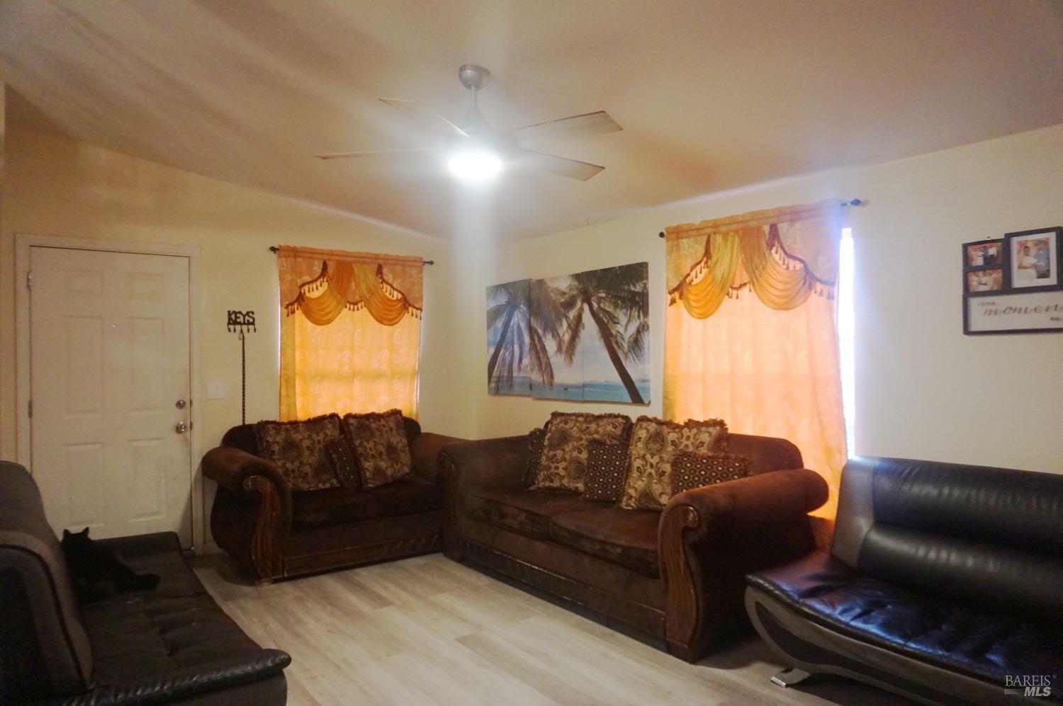 6004 Monticello Road, Unit 7 Napa, CA 94558 - Photo 7 of 33 a living room with furniture and a window