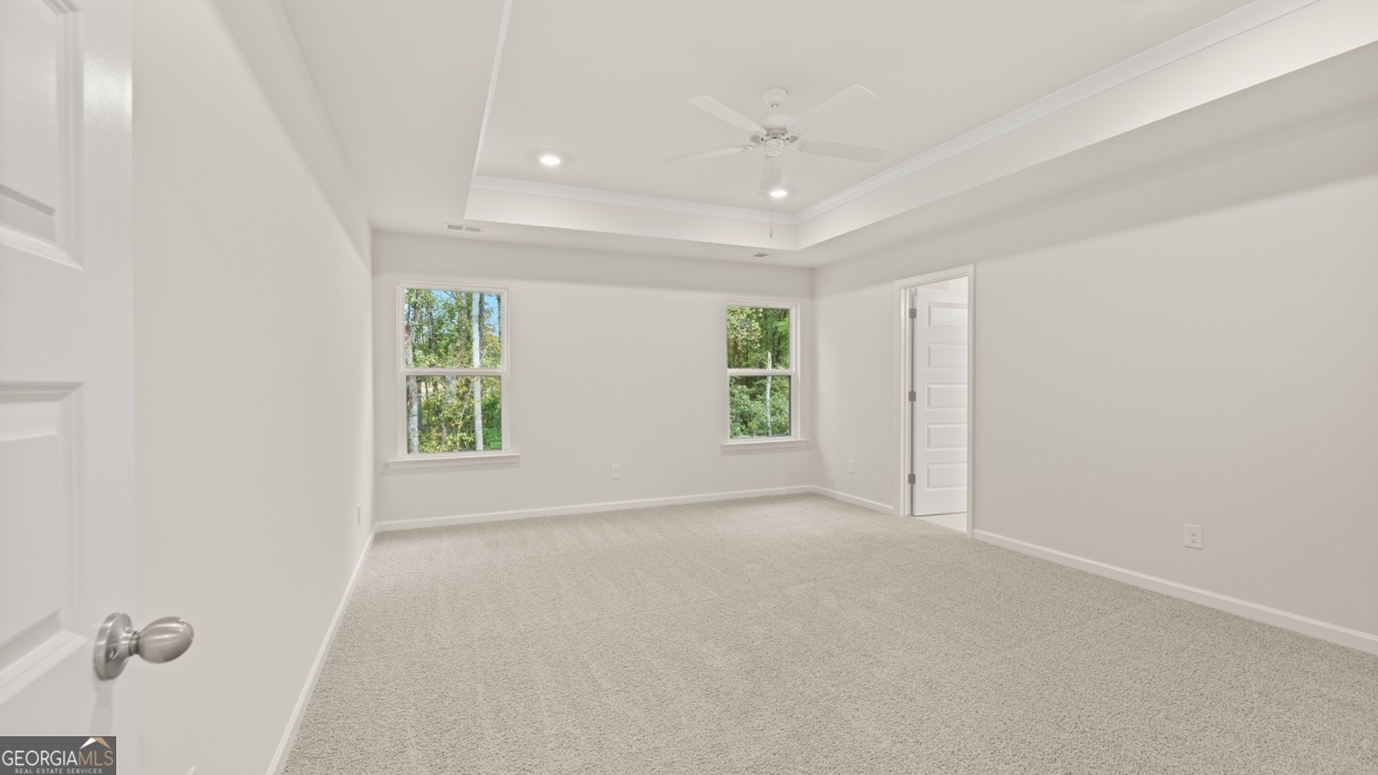 1816 Quaker Street Hampton, GA 30228 - Photo 16 of 32 an empty room with windows