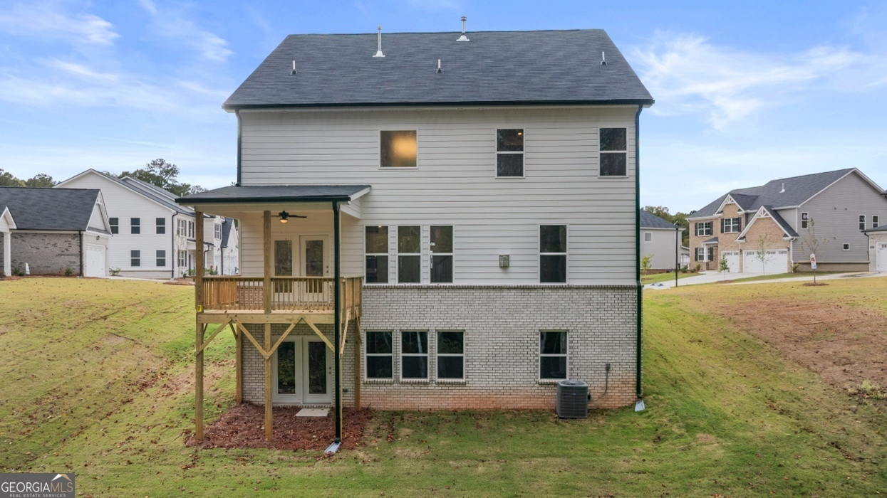 1816 Quaker Street Hampton, GA 30228 - Photo 28 of 32 a aerial view of a house with swimming pool