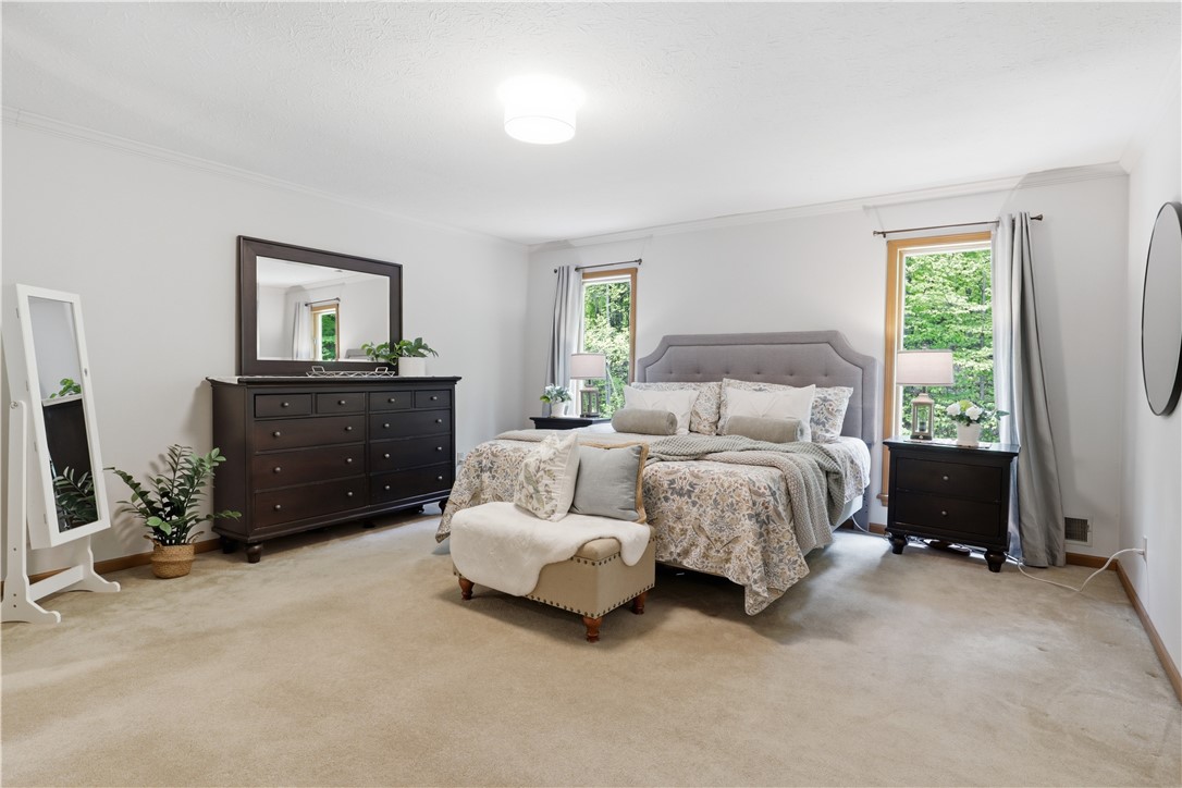 920 Willis Hill Road Victor, NY 14564 - Photo 22 of 42 Primary Suite with oversized walk-in closet.