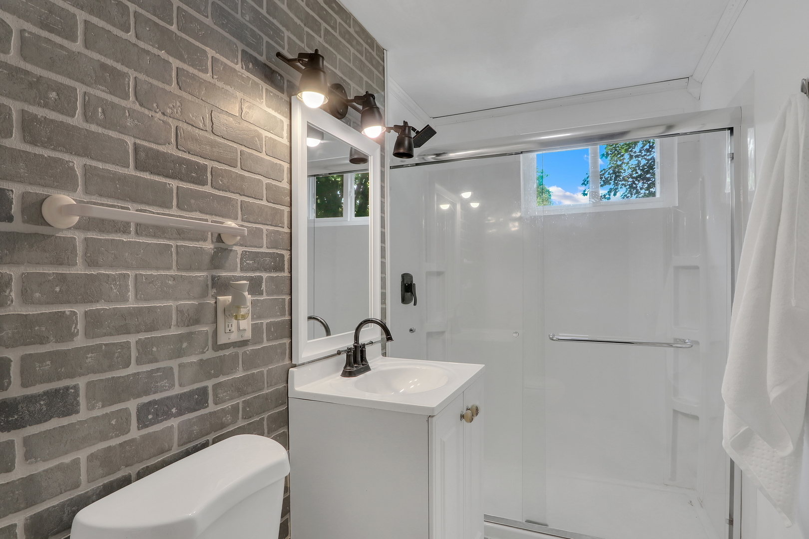 7120 East Tryon Grove Road Richmond, IL 60071 - Photo 29 of 33 a bathroom with a sink a toilet and shower