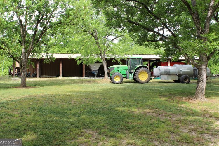 0 Shady Grove Road Hurtsboro, AL 36860 - Photo 14 of 19 a view of a house with a backyard