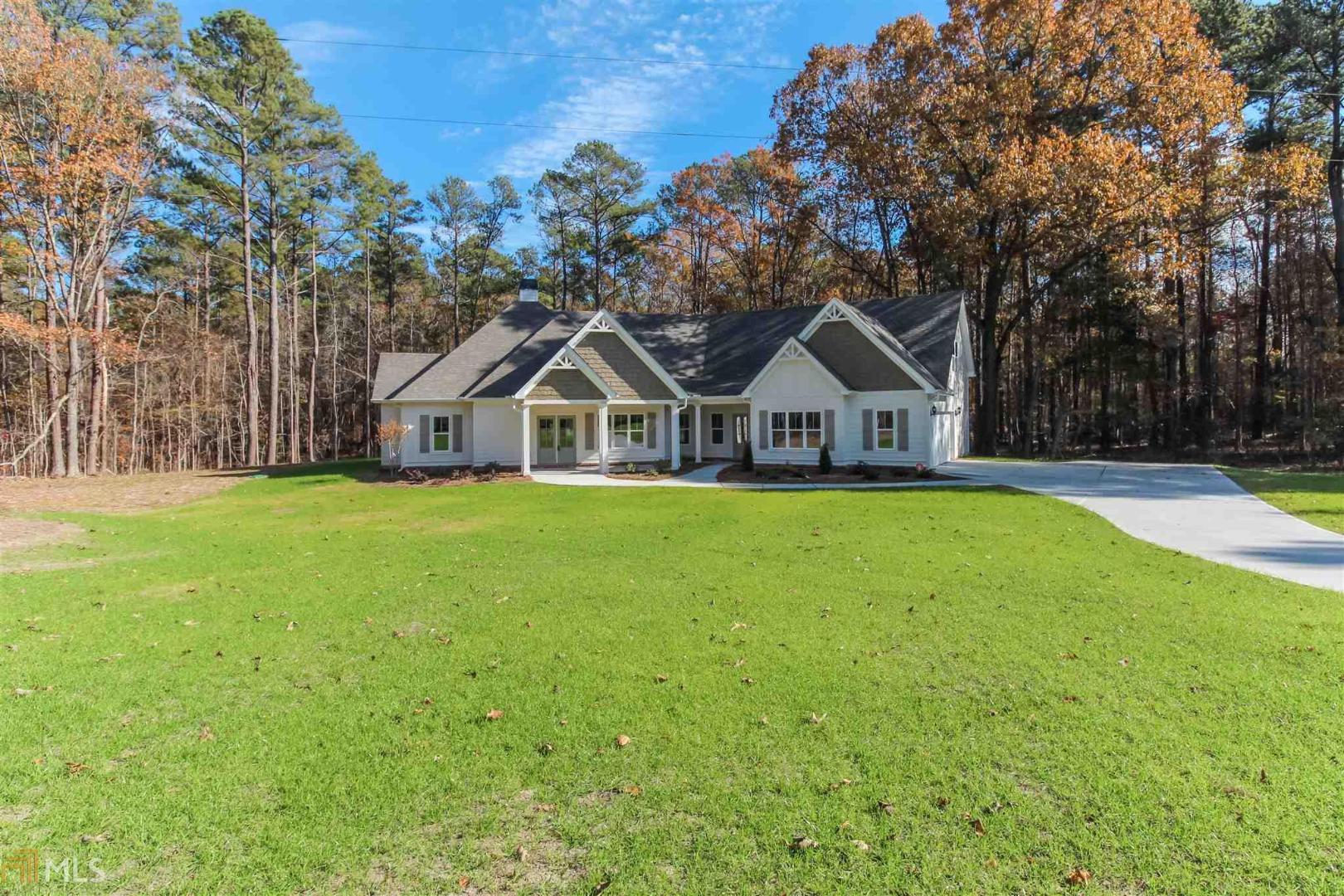 188 Carson Road, Unit 4 Brooks, GA 30205 - Photo 1 of 1 a view of house with garden