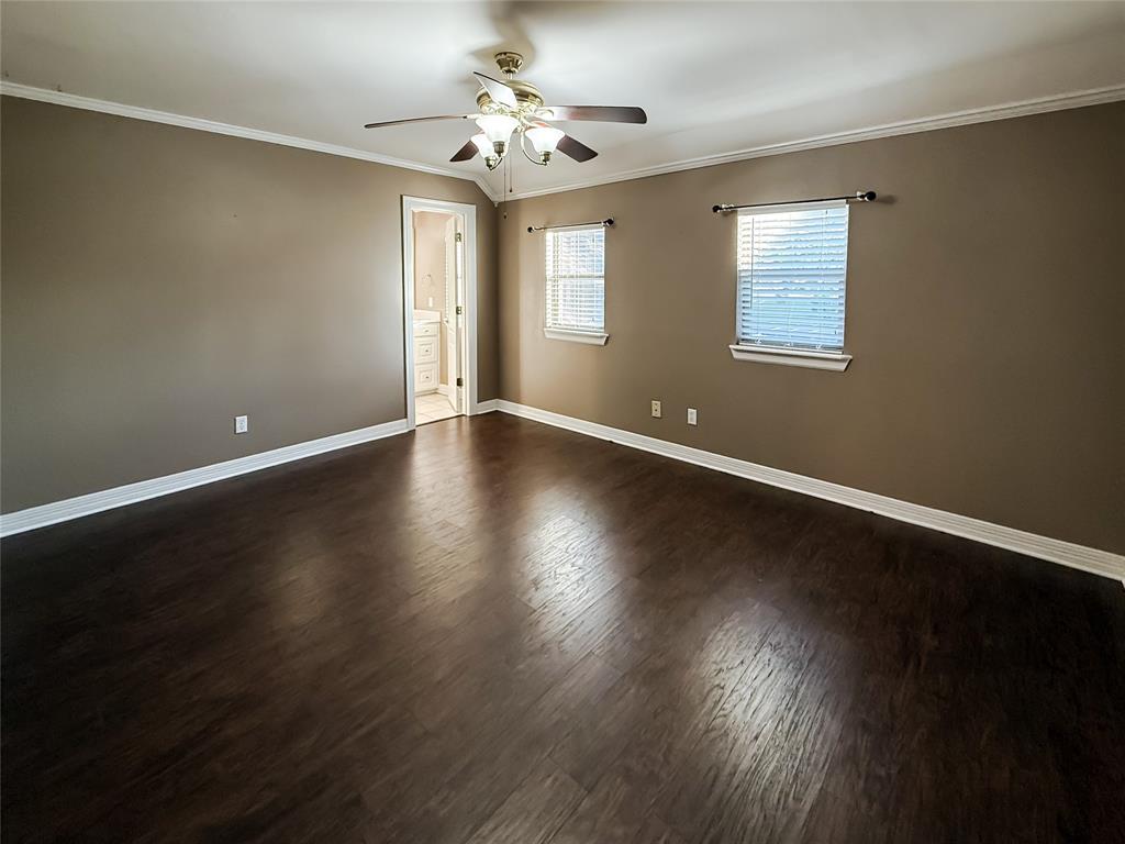 11 Fair Oaks Drive Haughton, LA 71037 - Photo 20 of 29 a view of an empty room with wooden floor and a window