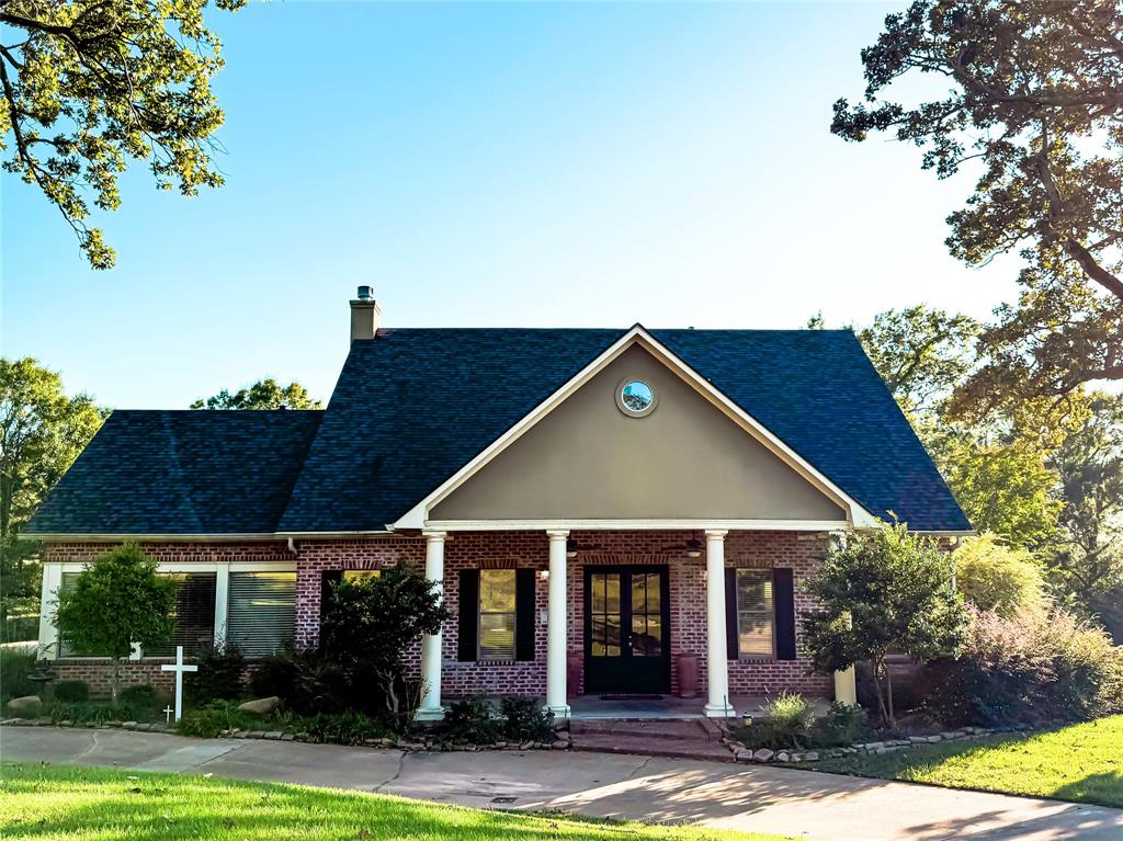 11 Fair Oaks Drive Haughton, LA 71037 - Photo 29 of 29 a front view of a house with garden