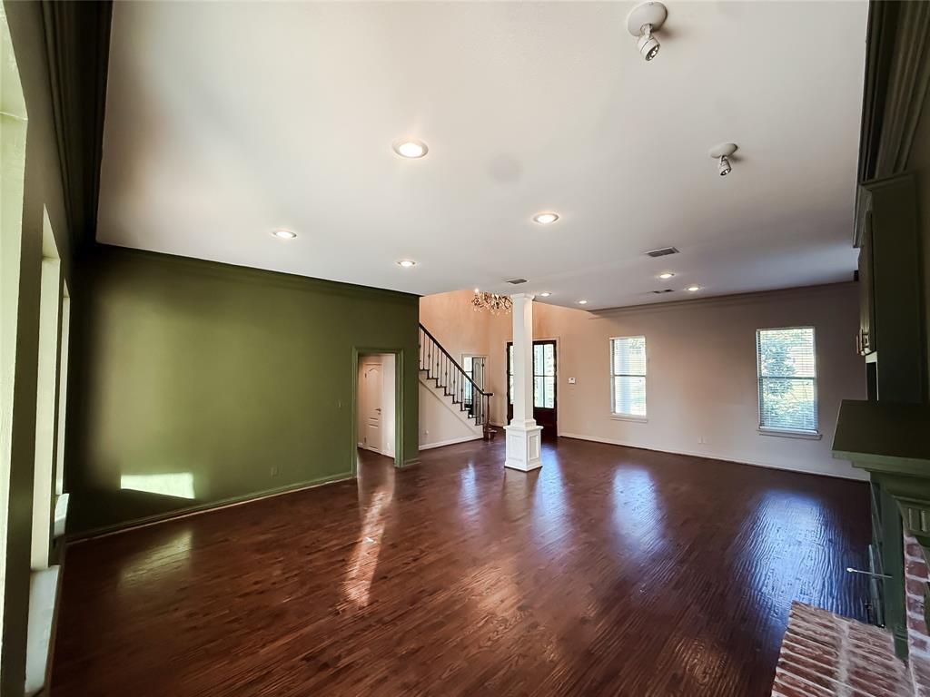 11 Fair Oaks Drive Haughton, LA 71037 - Photo 4 of 29 a view of an empty room with wooden floor and a window