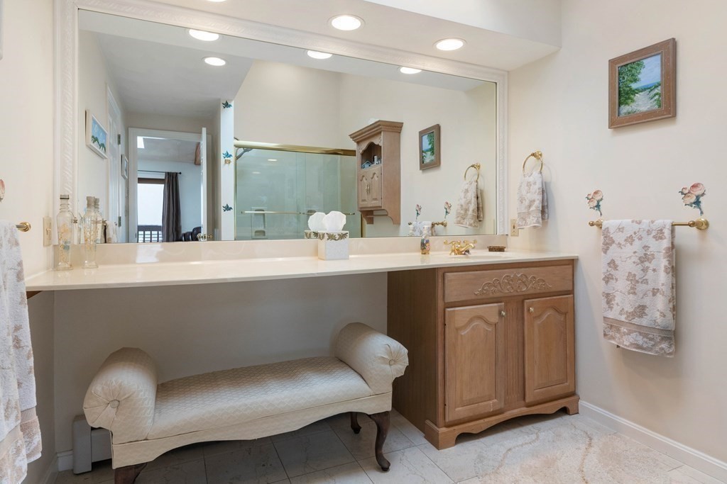 56 Skytop Road Ipswich, MA 01938 - Photo 18 of 42 a bathroom with a sink vanity and a mirror