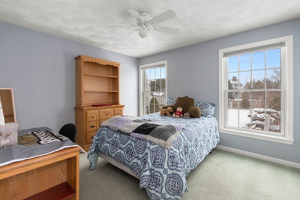56 Skytop Road Ipswich, MA 01938 - Photo 19 of 42 a bedroom with a bed and window