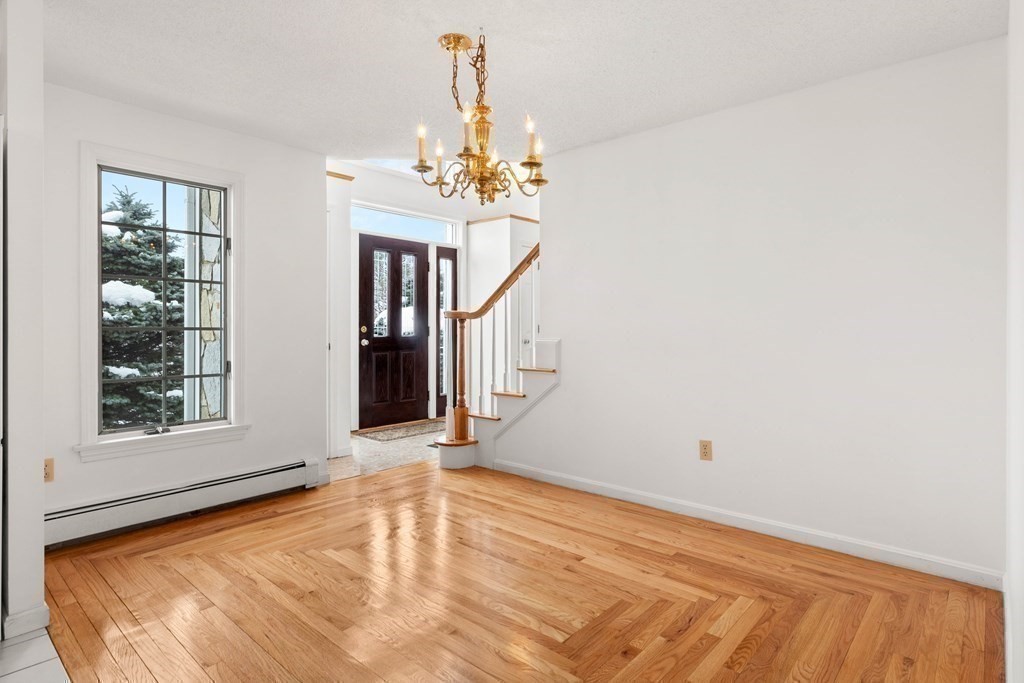 56 Skytop Road Ipswich, MA 01938 - Photo 20 of 42 a view of an empty room with a window
