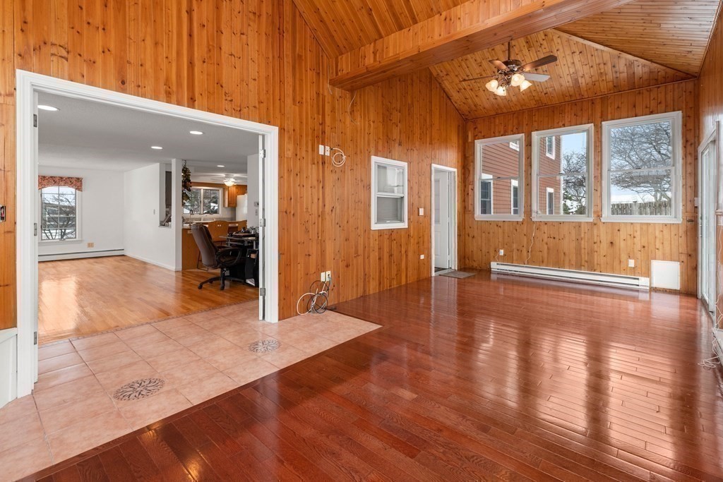 56 Skytop Road Ipswich, MA 01938 - Photo 26 of 42 wooden floor in an empty room with a window