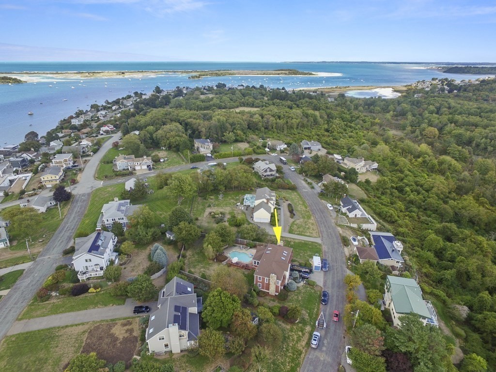 56 Skytop Road Ipswich, MA 01938 - Photo 4 of 42 an aerial view of ocean and residential houses with outdoor space
