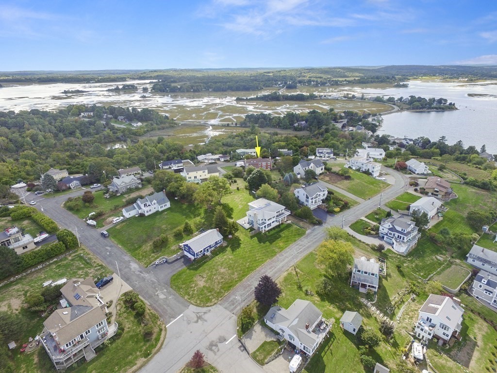 56 Skytop Road Ipswich, MA 01938 - Photo 5 of 42 an aerial view of ocean and residential houses with outdoor space