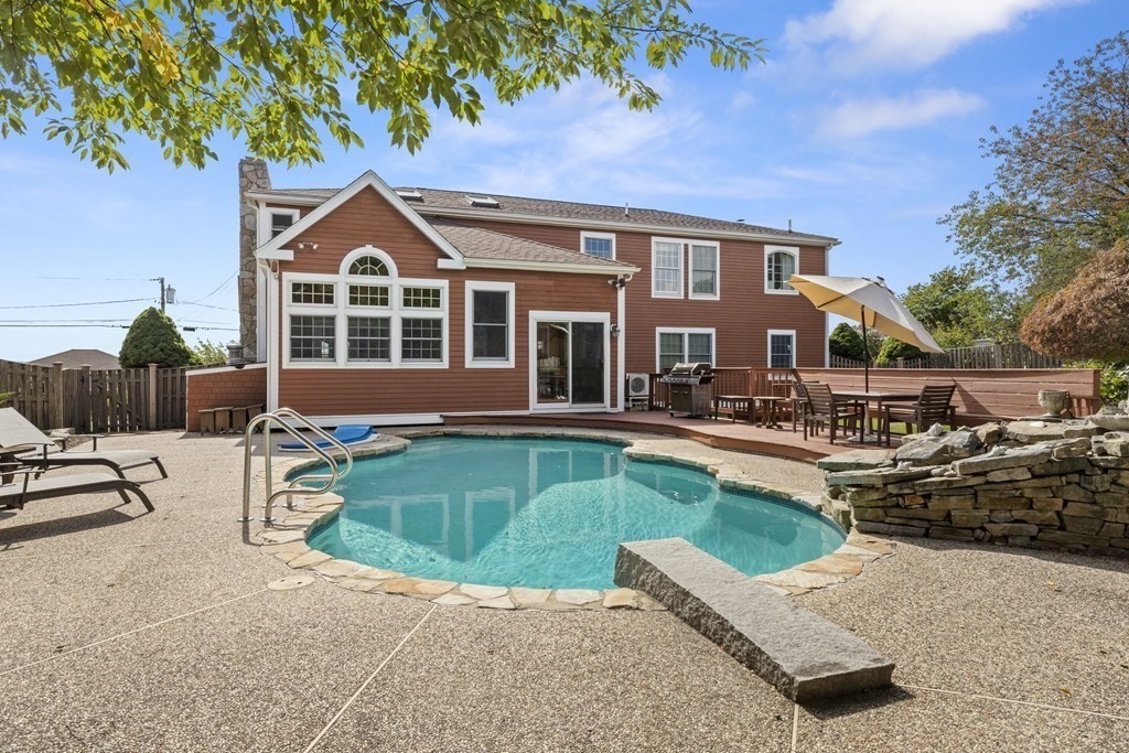 56 Skytop Road Ipswich, MA 01938 - Photo 6 of 42 a front view of a house with garden