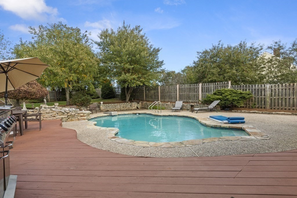 56 Skytop Road Ipswich, MA 01938 - Photo 9 of 42 a view of a swimming pool with a patio