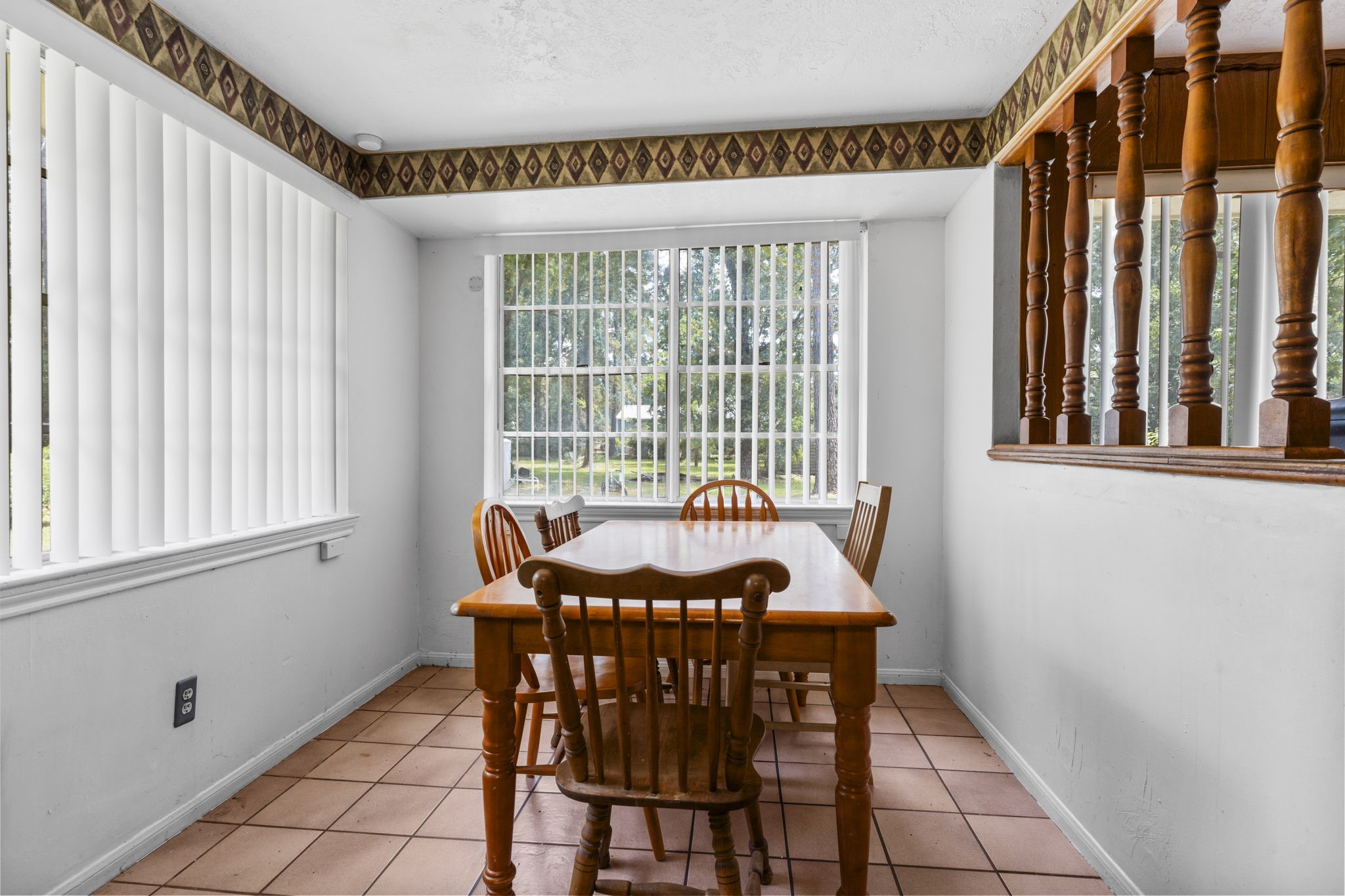 2395 Southline Road Conroe, TX 77384 - Photo 11 of 44 a dining room with furniture and window