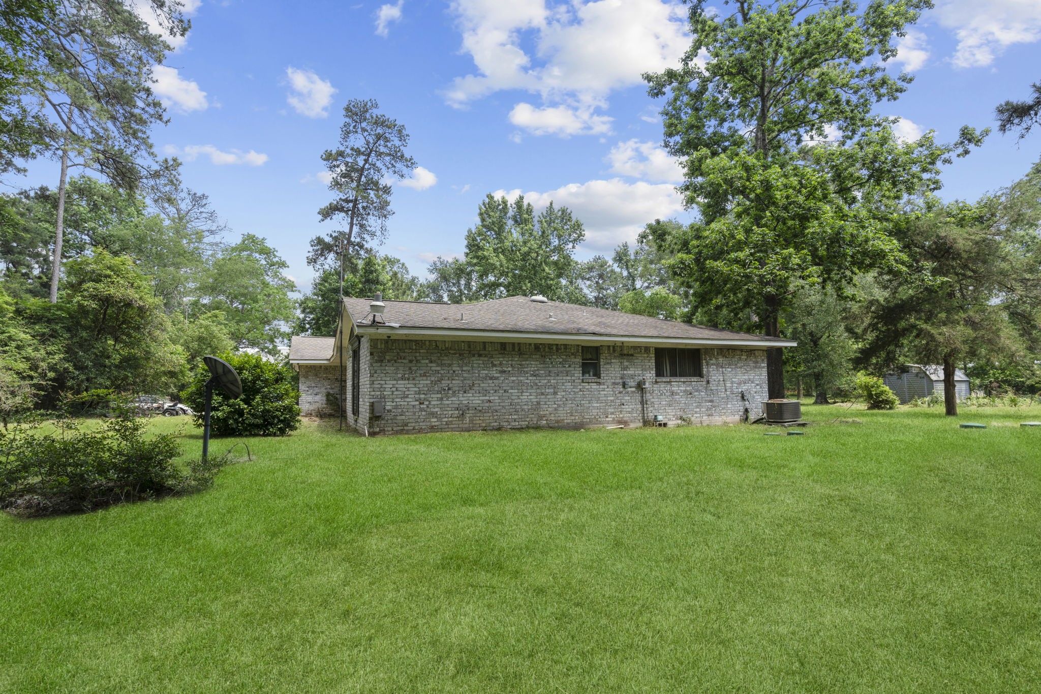 2395 Southline Road Conroe, TX 77384 - Photo 30 of 44 a view of a garden