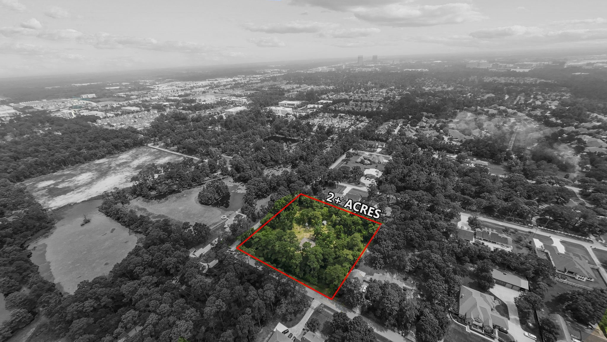 2395 Southline Road Conroe, TX 77384 - Photo 42 of 44 an aerial view of residential house with outdoor space